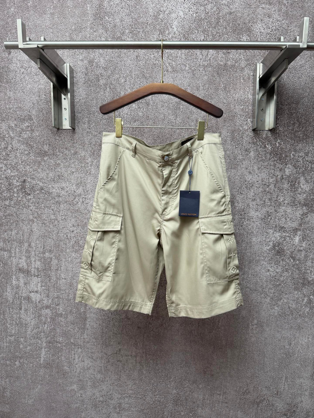 Light beige cargo shorts, button front and flap side pockets