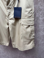 Light beige cargo shorts with front button, patch pockets, Louis Vuitton tag