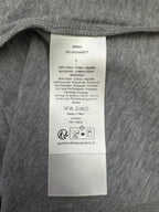 Inside clothing label on heather gray T-shirt with size L and fabric details