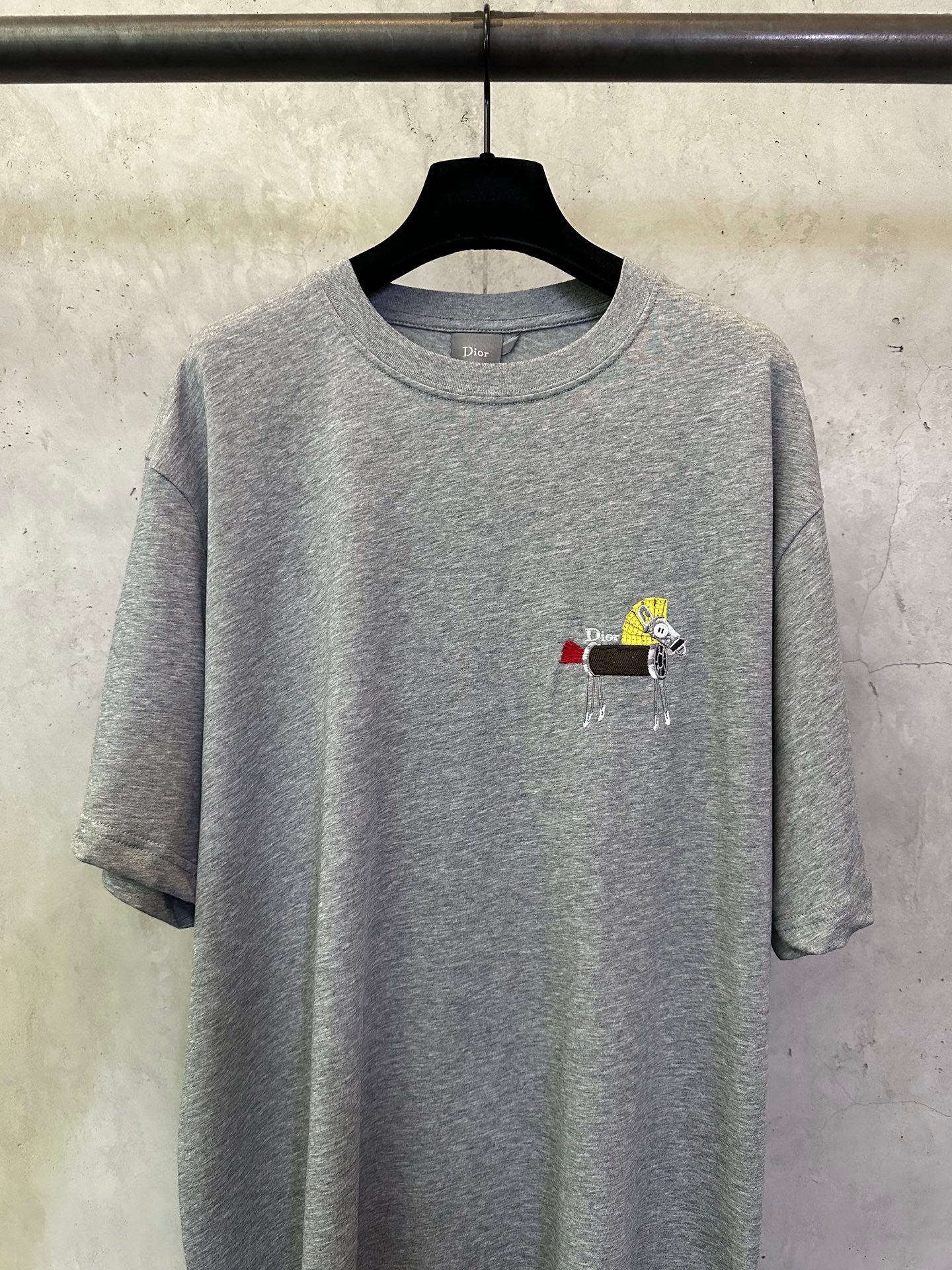 Heather gray short-sleeve T-shirt with chest graphic and crew neck