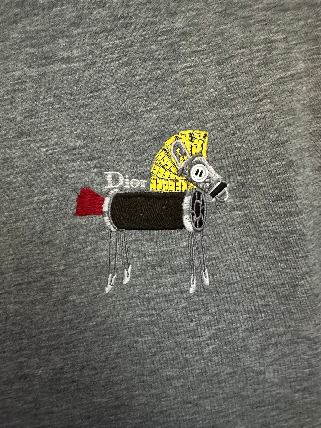 Heather gray T-shirt with colorful animal graphic patch across chest