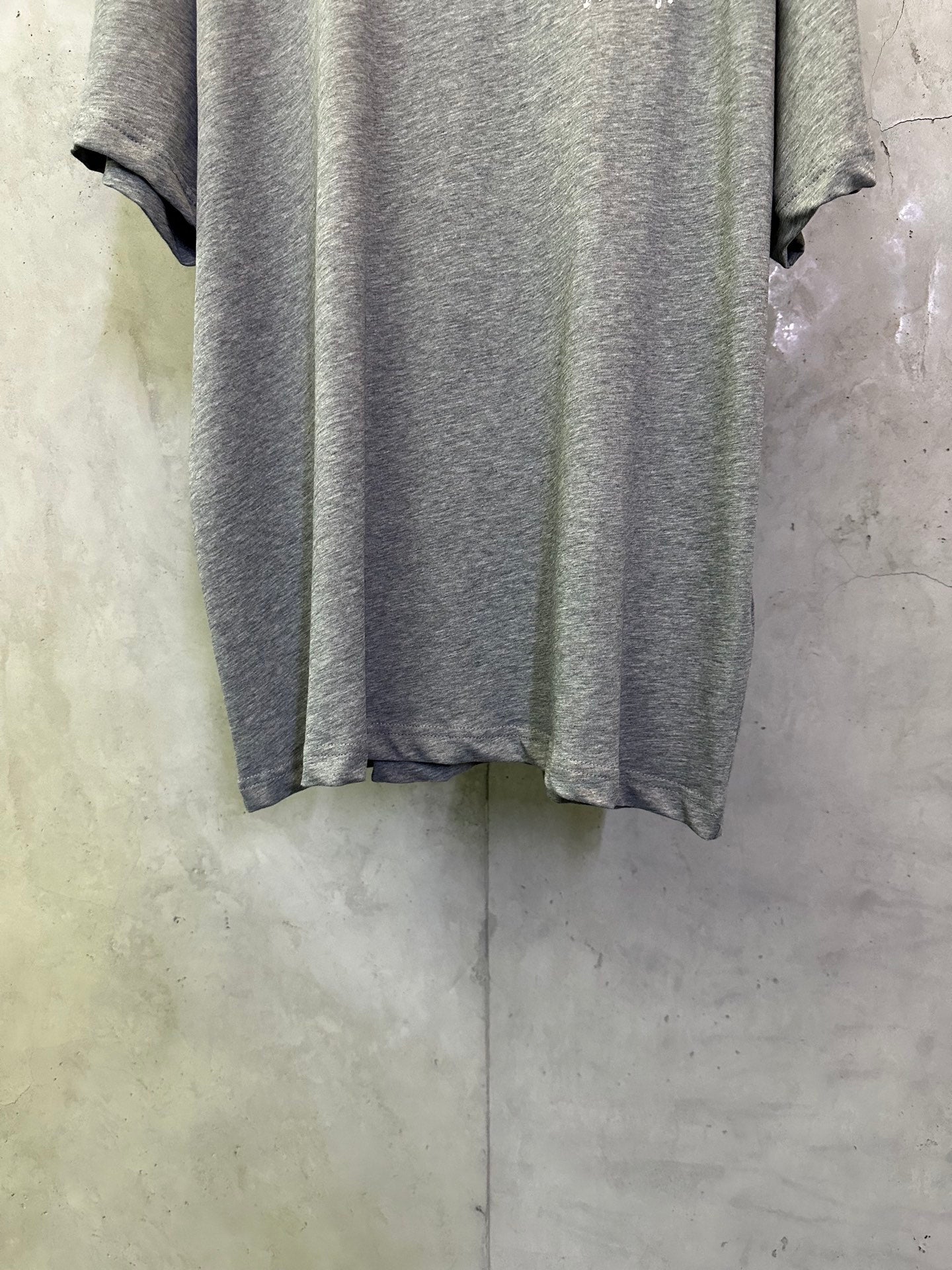 Heather gray short-sleeve T-shirt front view, crew neckline and hem
