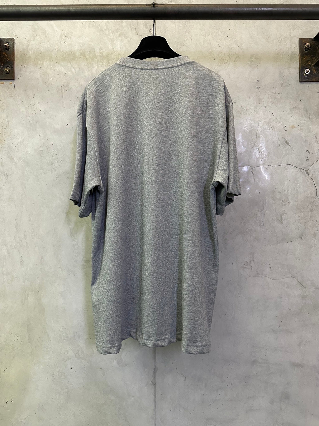 Heather gray short-sleeve T-shirt, back view with draped shoulder sleeves