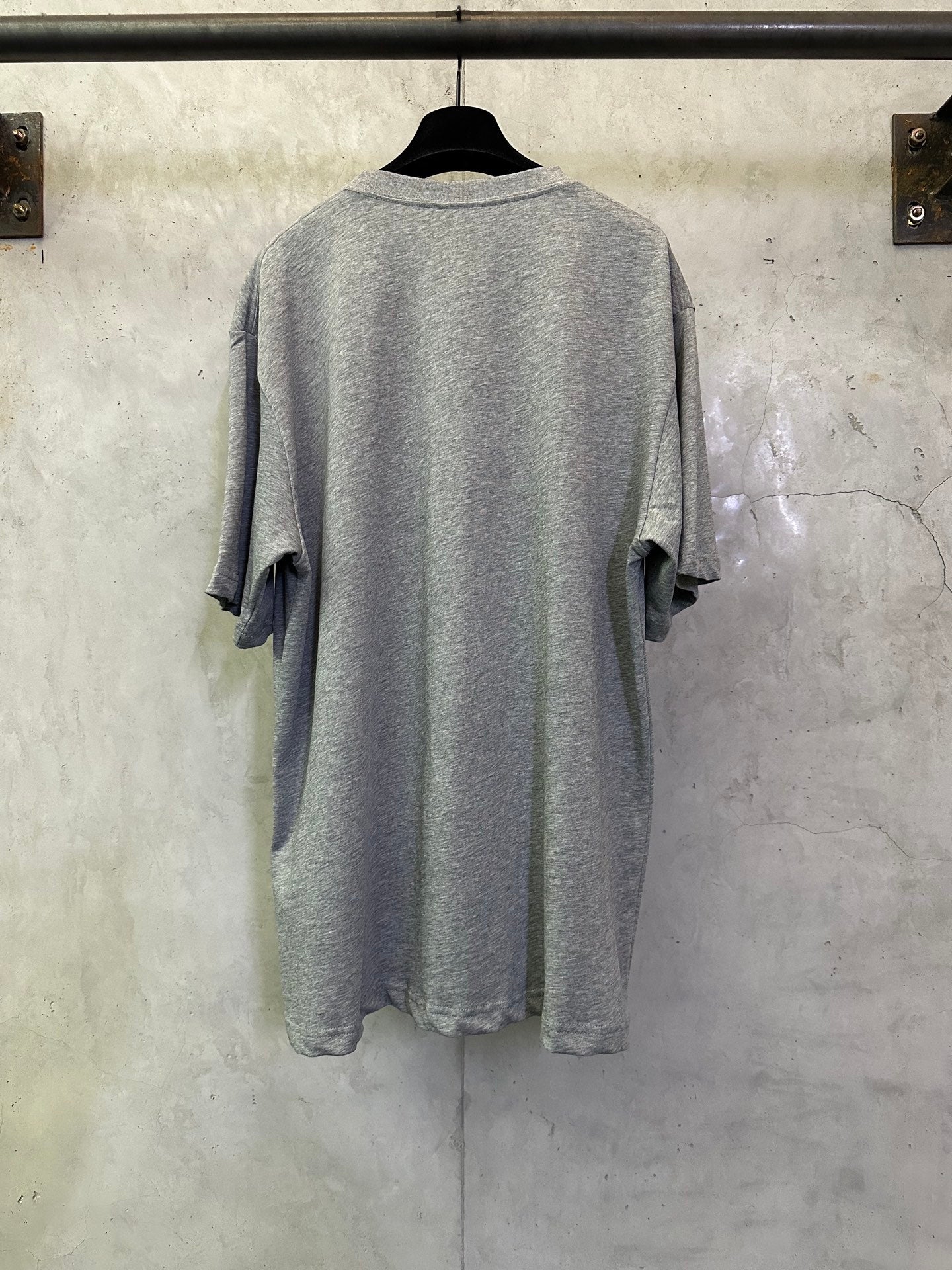 Heather gray short-sleeve T-shirt, back view with draped shoulder sleeves