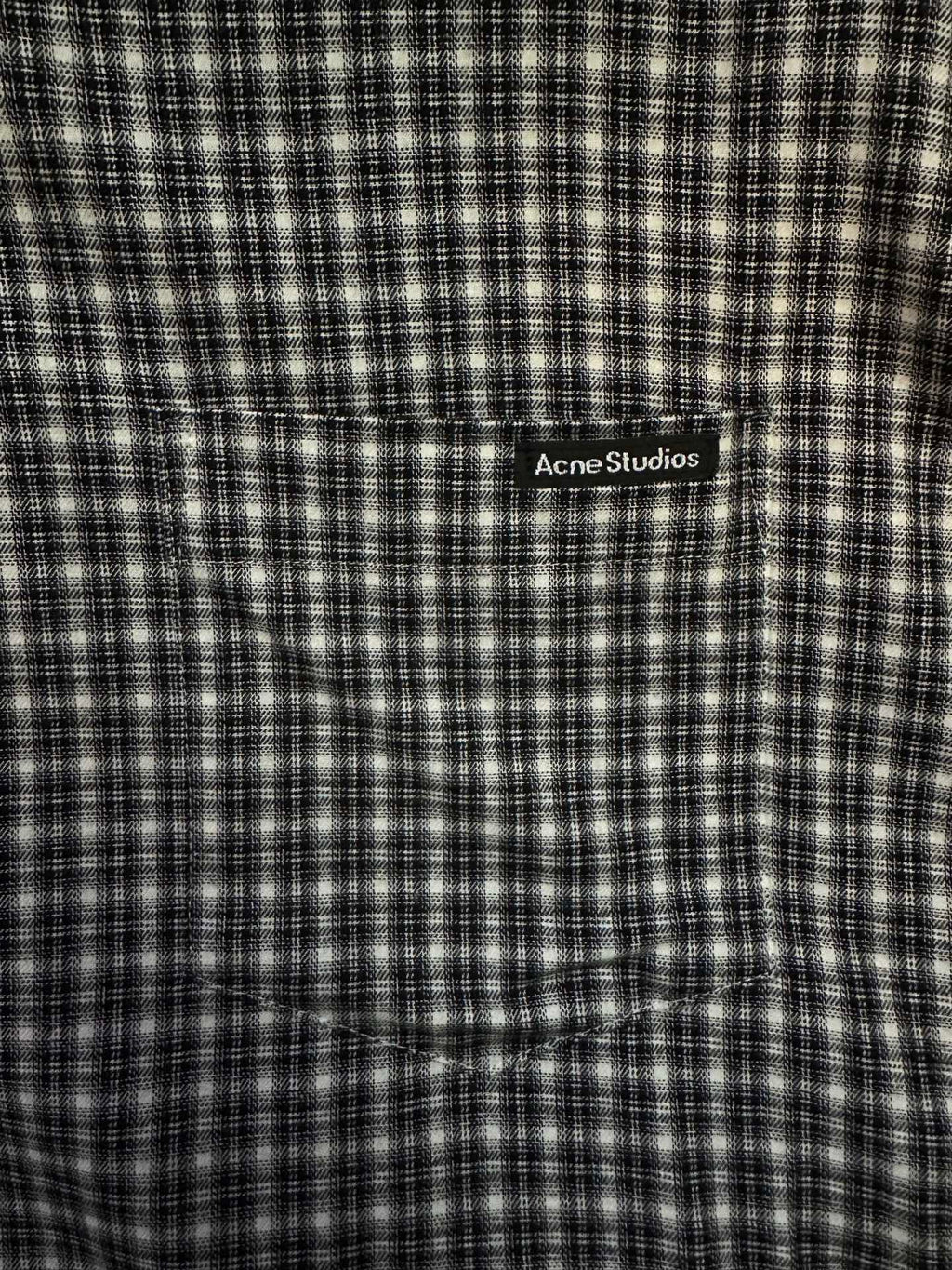 Balenciaga long plaid long-sleeve shirt close-up of chest logo patch