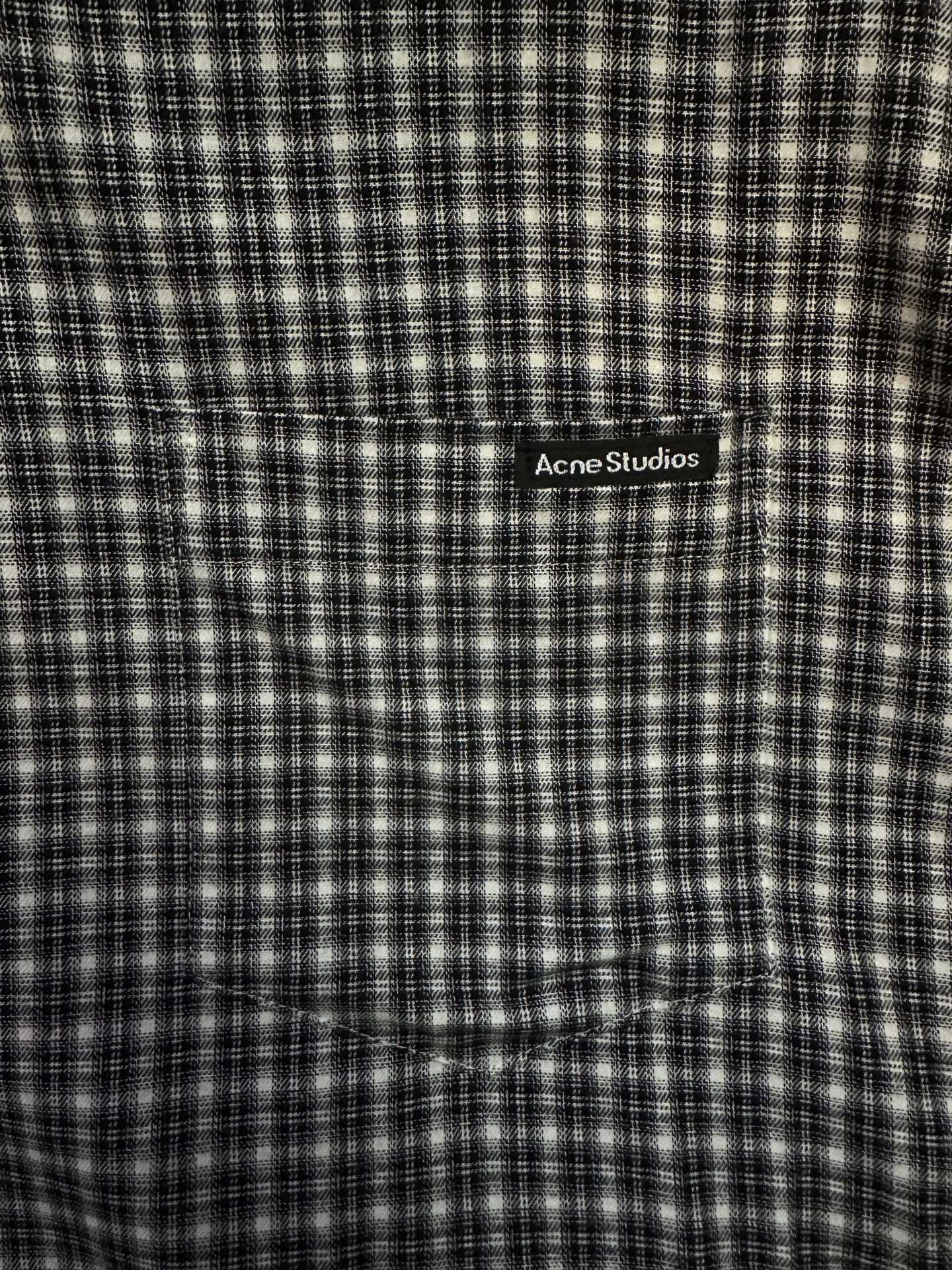 Balenciaga long plaid long-sleeve shirt close-up of chest logo patch