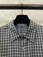 Balenciaga long plaid long-sleeve shirt close-up of collar and button front