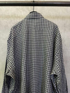 Balenciaga long plaid long-sleeve shirt, back view with rounded hem