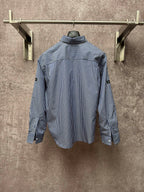 Long-sleeve button-up shirt with vertical blue-and-white stripes, standing collar, back view.