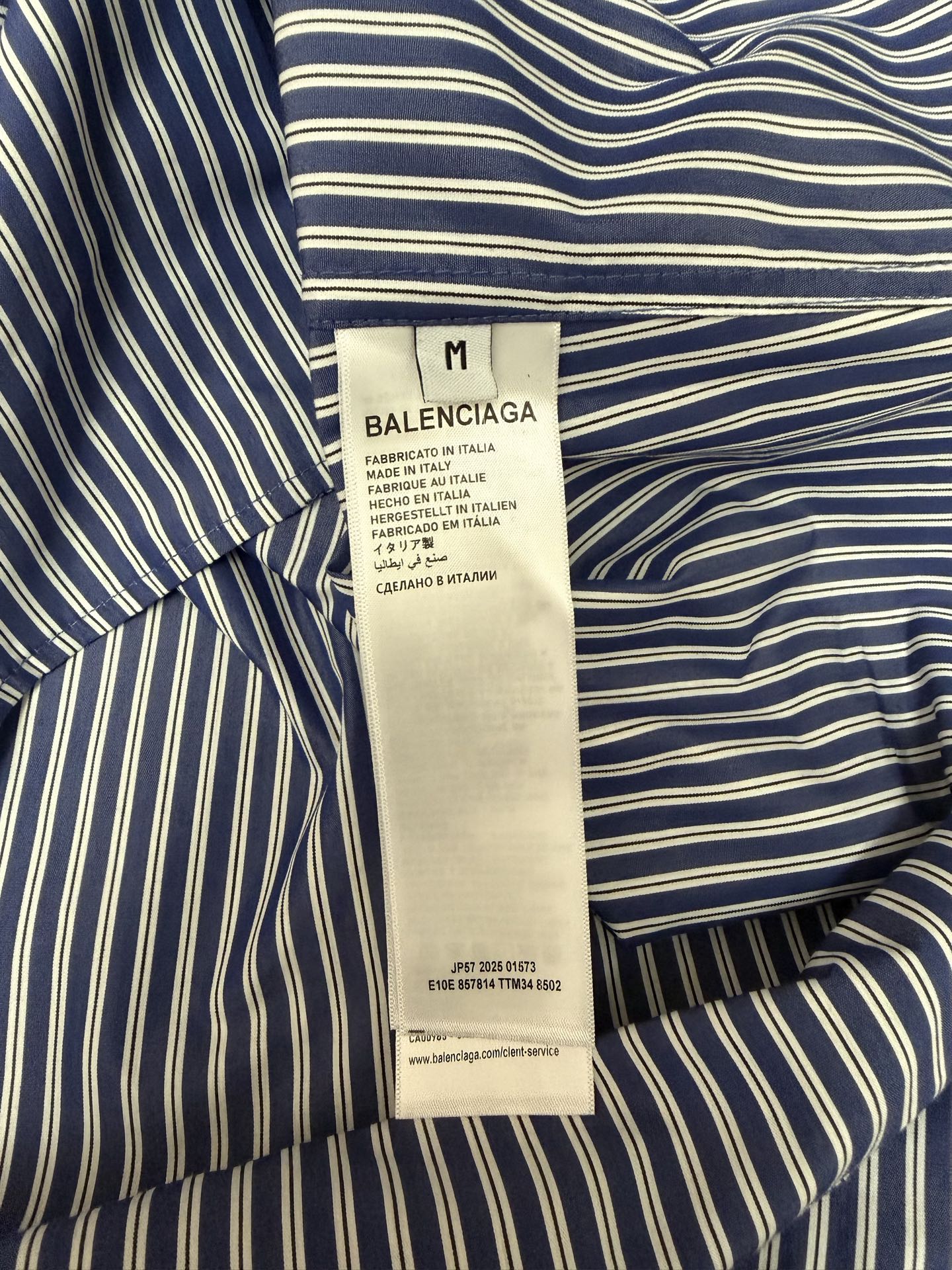 Long Balenciaga striped shirt with blue and white stripes, neck and label visible
