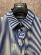 Striped button-up shirt with spread collar, front buttons, chest pocket, and logo labels.