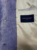 Denim jacket interior with louis vuitton paris fabric label and gold button