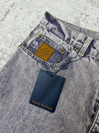 Denim waistband with Louis Vuitton leather logo patch and button closure