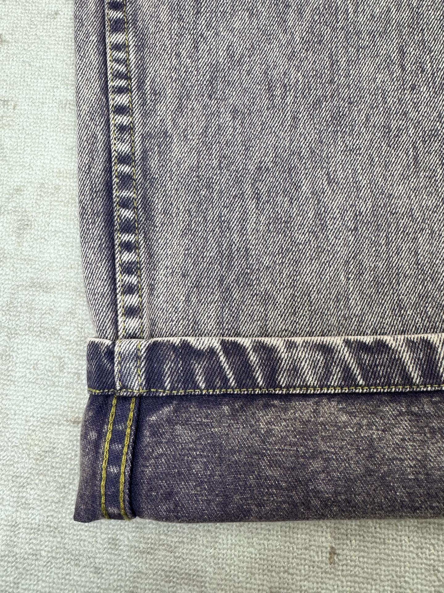 Denim waistband and cuff with belt loop and stitched fold