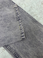 Light blue denim hem and cuff with stitched detail and belt loop