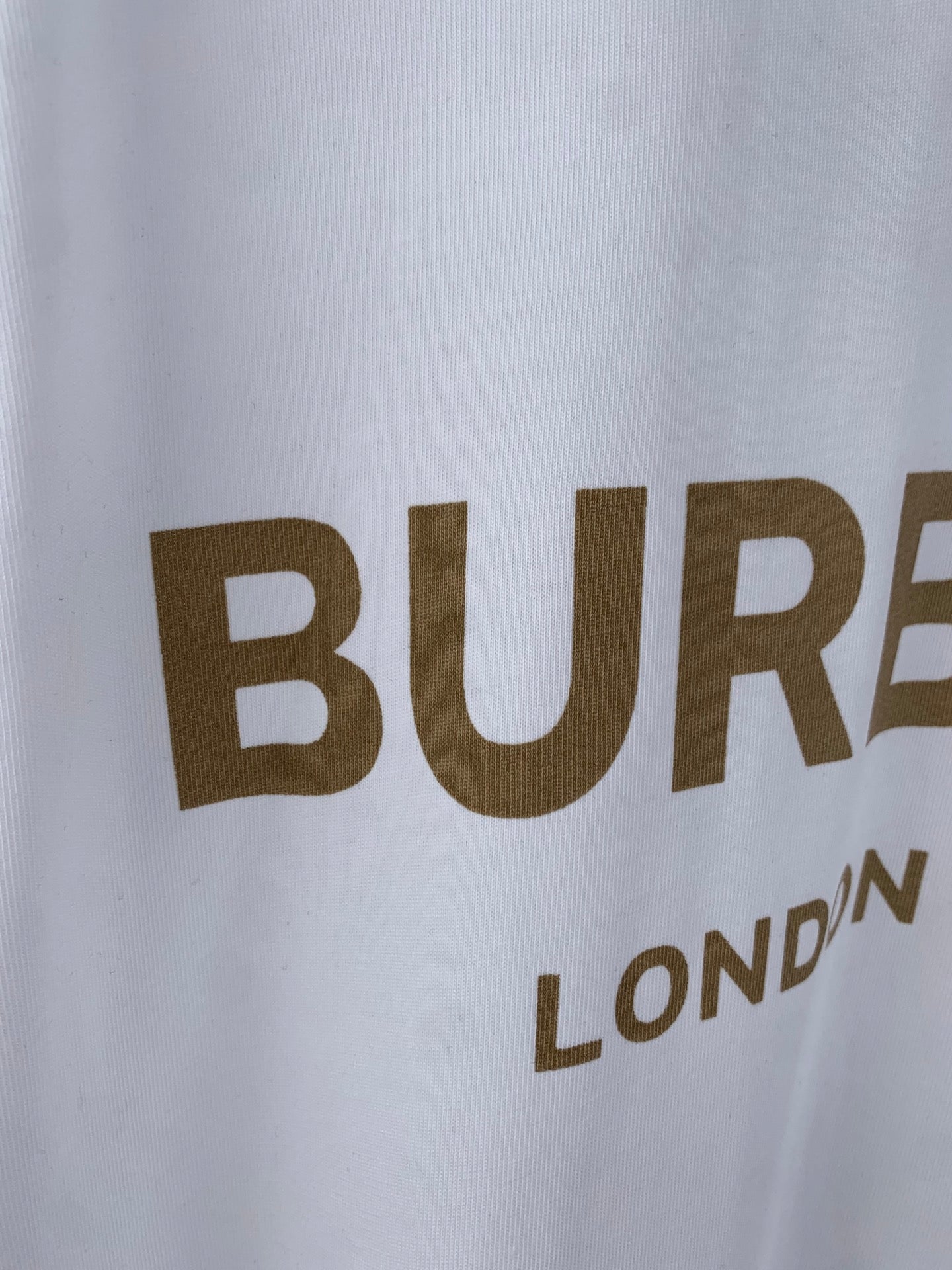 White Burberry T-shirt with large BURBERRY lettering and London England line