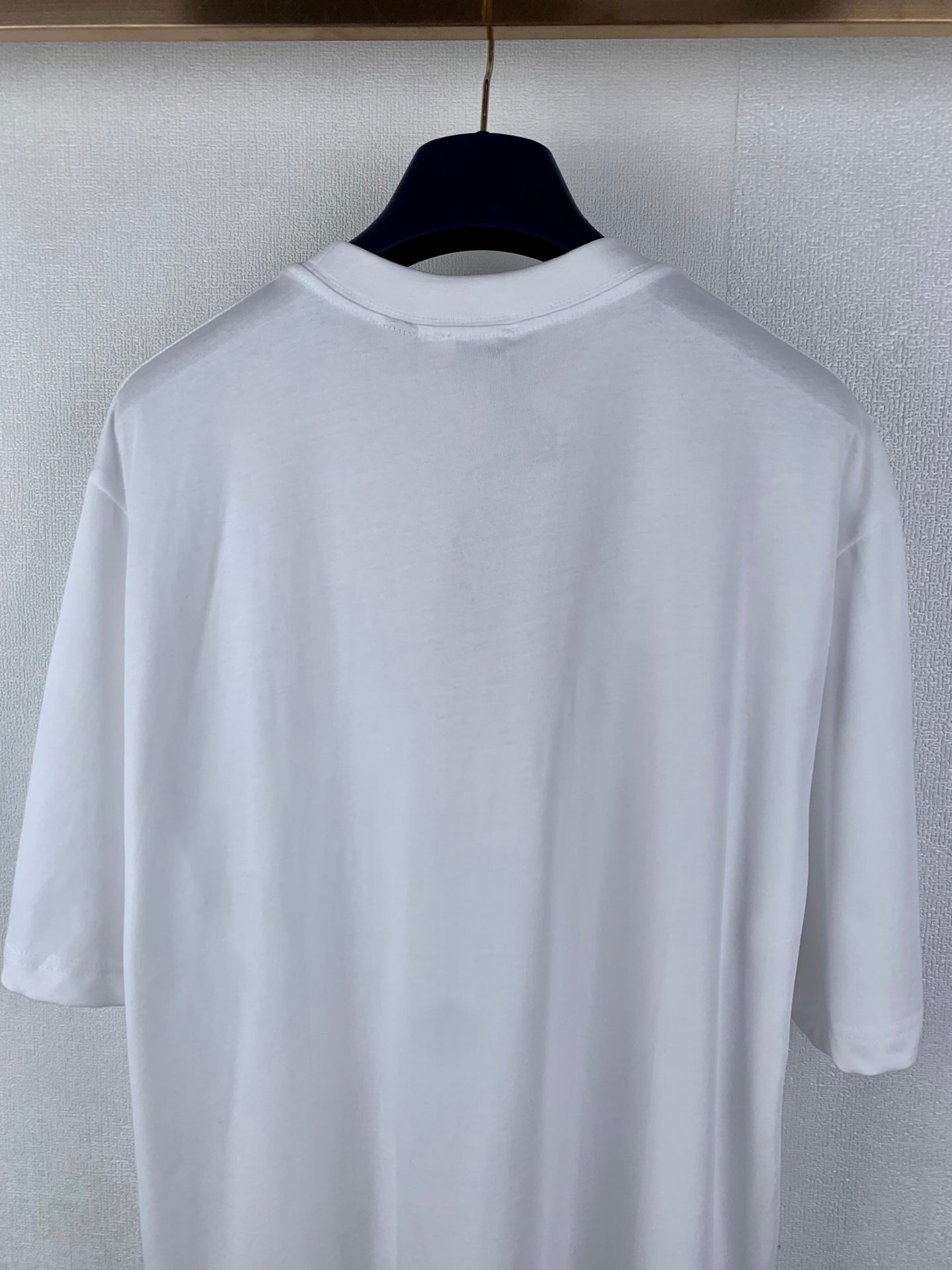 White Burberry crew-neck T-shirt, plain back close-up