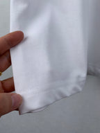 White Burberry T-shirt hem with visible double-stitching
