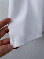 White T-shirt side hem with stitched seam
