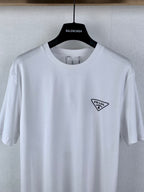 White short-sleeve T-shirt with small Prada triangle logo on chest