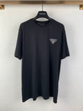 Black short-sleeve T-shirt with PRADA triangular chest logo, crew neck.