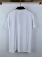 White polo shirt back view on hanger