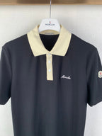 Moncler polo shirt with cream collar, button placket, and chest logo