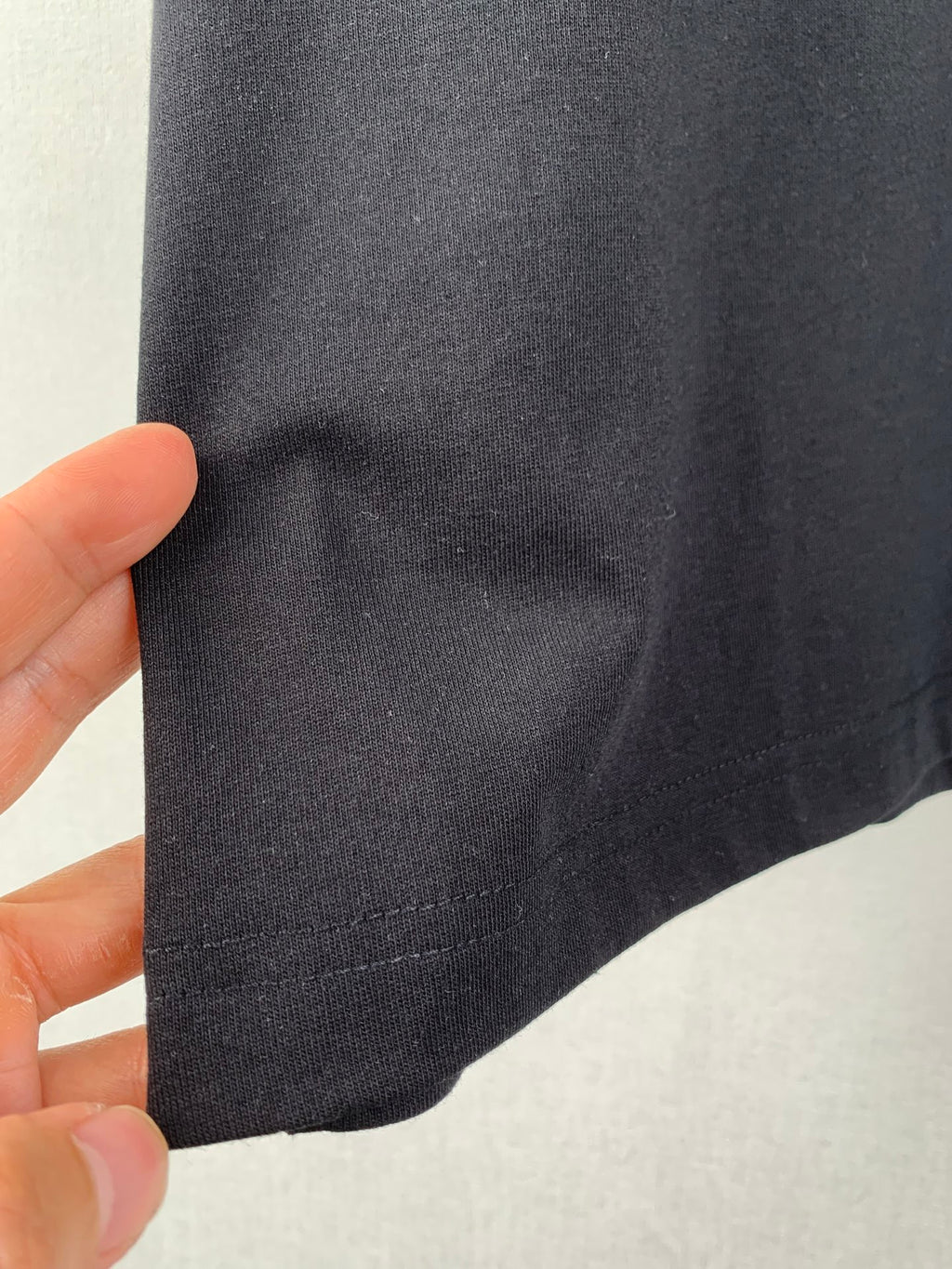 Burberry short-sleeve T-shirt hem with fabric texture close-up