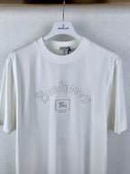 White T-shirt with MONCLER neck label and Burberry logo at chest