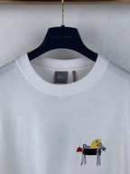 White short-sleeve T-shirt with Dior logo graphic and crew neckline