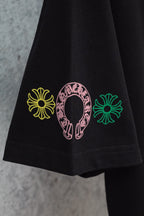 Chrome short T-shirt sleeve, black with three small colored cross-flower icons