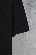 Black short-sleeve T-shirt sleeve hem with stitched seam detail