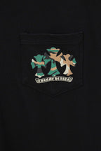 Black graphic T-shirt pocket with multicolor cartoon-style print