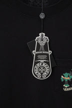 Black short-sleeve T-shirt with hanging tag and crest label