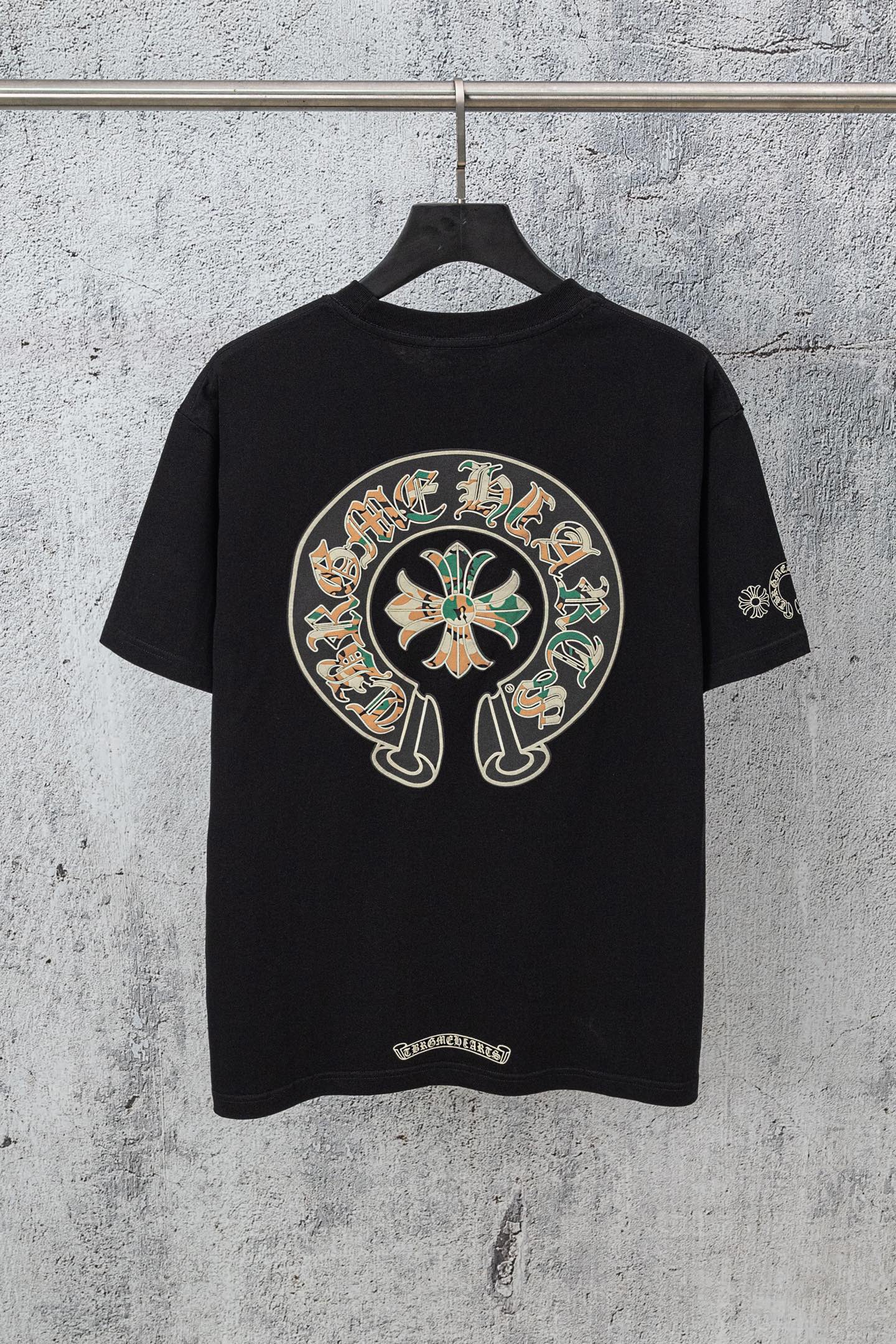 Black short-sleeve T-shirt with large round back graphic and small sleeve print
