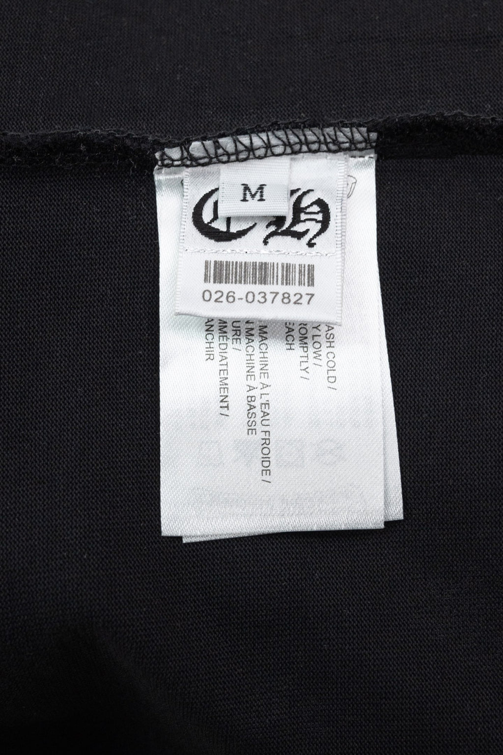Black short-sleeve T-shirt size label and care tag