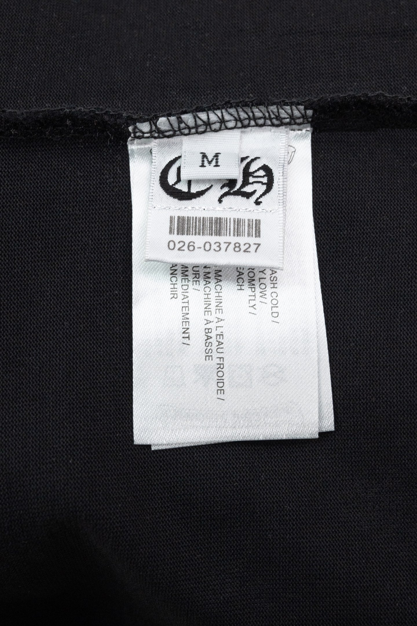 Black short-sleeve T-shirt size label and care tag