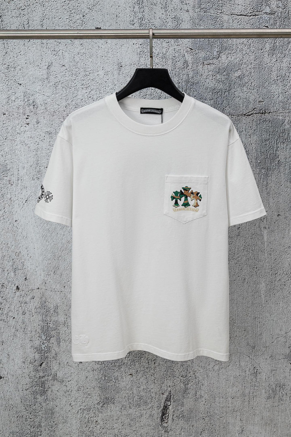 White short-sleeve T-shirt with pocket and small chest crest graphic