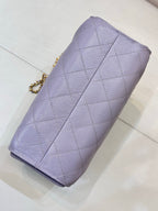 Lavender quilted phone case with gold chain strap and diagonal seam stitching