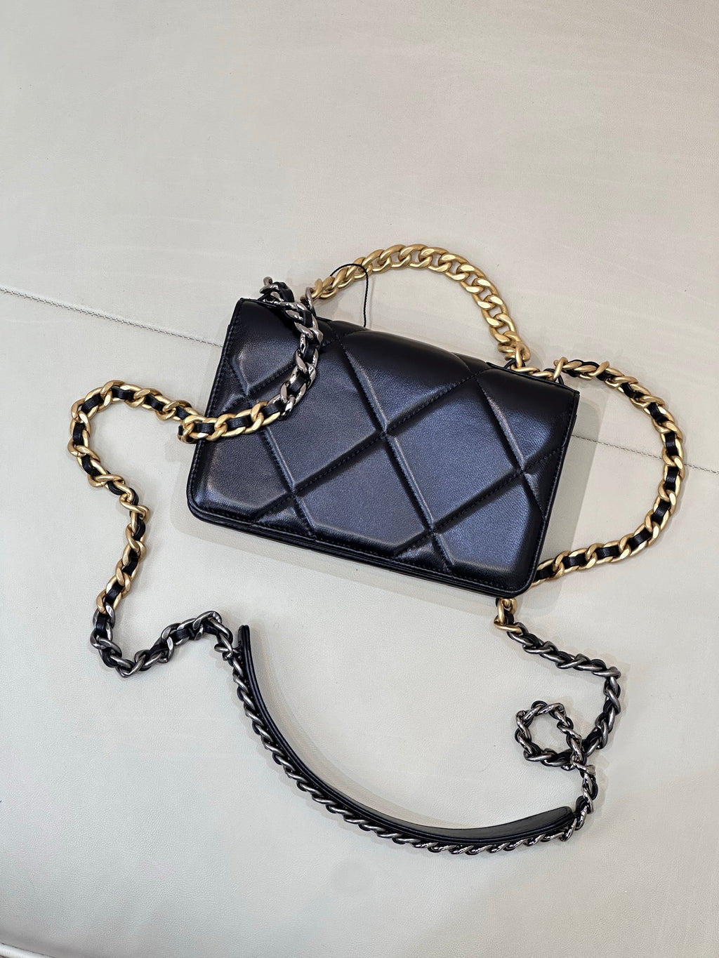 Chanel quilted mini crossbody bag with dark blue diamond panel and two-tone chain