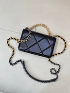 Chanel quilted mini crossbody bag with dark blue diamond panel and two-tone chain