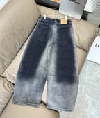 Dark blue denim wide-leg pants with belt loops, button fly, and front pockets