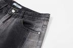 Dark gray denim pants with slanted front pocket and button-fly