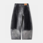 Washed dark gray denim pants with front pockets and belt loops