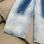 Light blue washed denim pants, wide leg silhouette and side seam detail