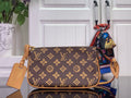 Louis Vuitton monogram crossbody bag with tan leather trim and shoulder strap