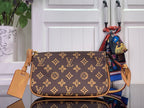 Louis Vuitton monogram crossbody bag with tan leather trim and shoulder strap