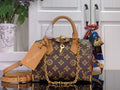Louis Vuitton monogram handbag with tan strap and gold hardware, front view