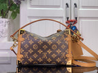 Louis Vuitton monogram hobo bag with tan handles, front straps, and gold-tone hardware