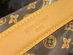 Louis Vuitton leather strap with embossed 'Louis Vuitton Paris' and yellow stitching